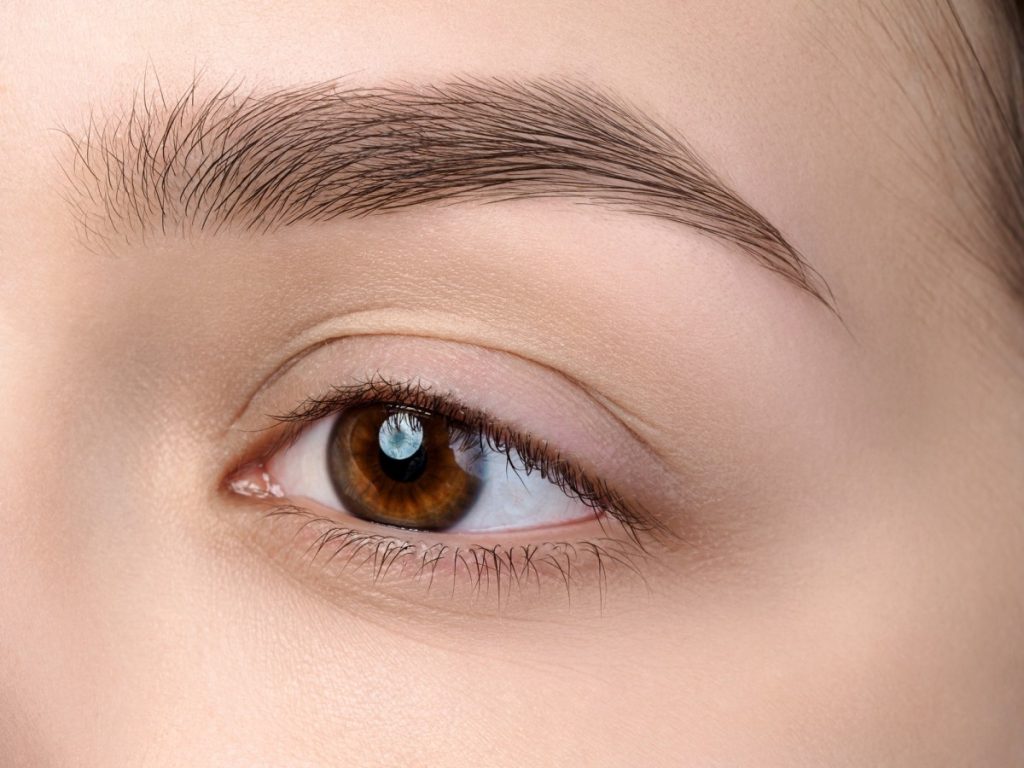 13 Ways To Look 10 Years Younger Naturally Without Costing The Earth; Close up view of beautiful brown female eye