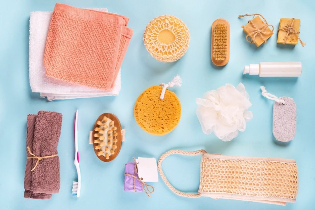 How To Have The Best At Home Spa Day: 25 Genius Ideas; Scrub peeling brush body scrubber massager loofah bar of soap on blue